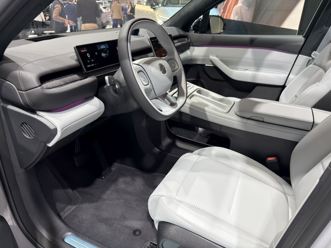 Dual widescreen digital displays and minimalist steering wheel interior