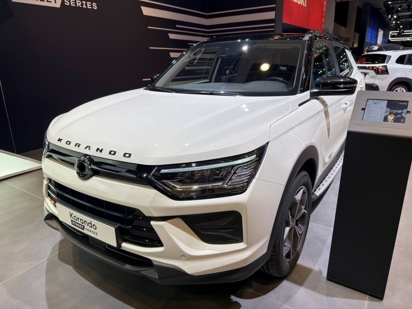 Modern SUV front view with LED headlights and bold grille