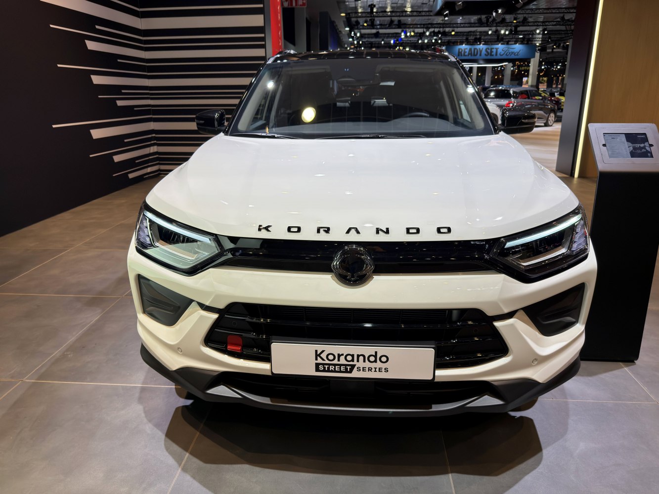 Front view of SUV with LED headlights and bold grille design