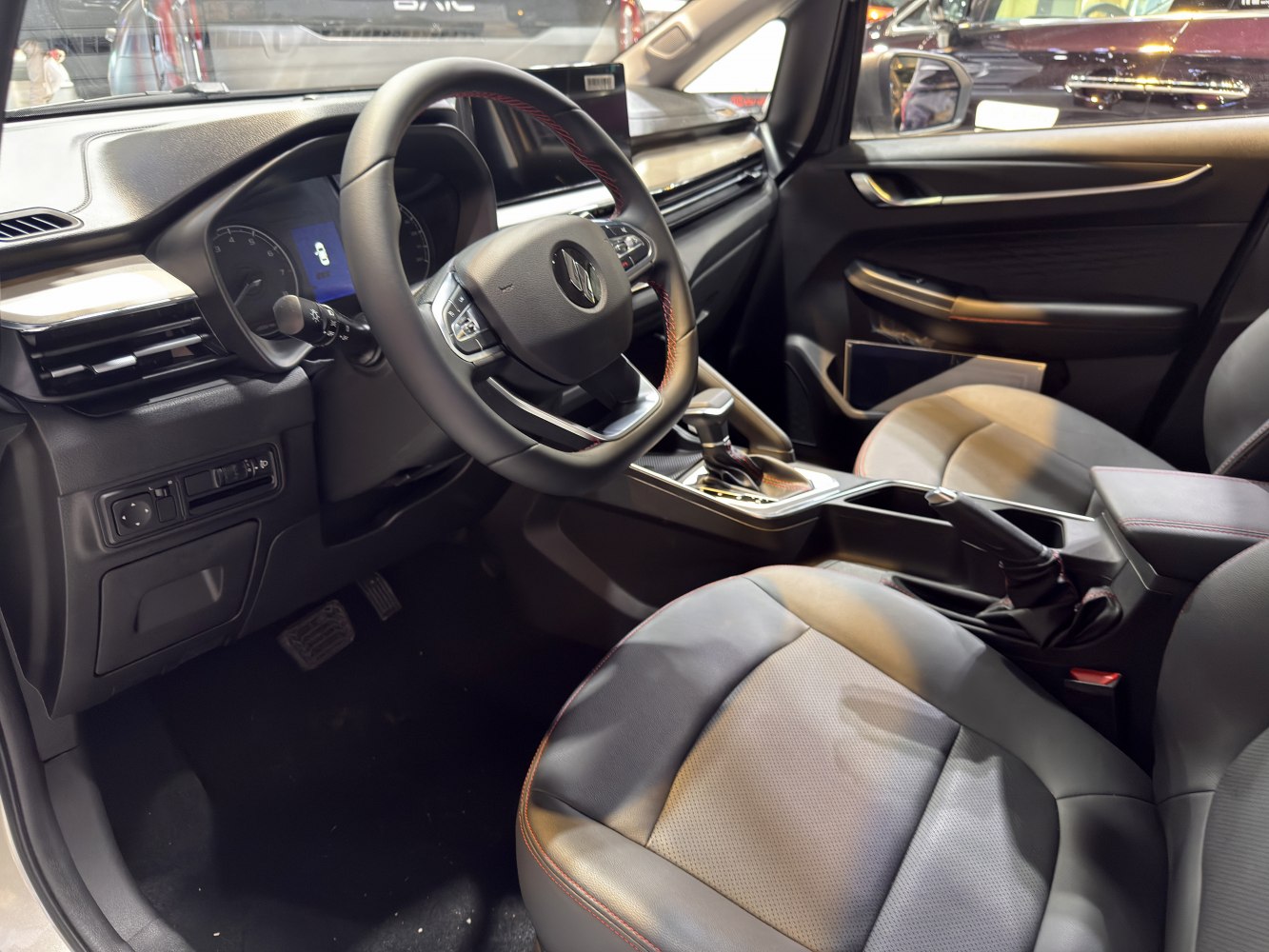 Modern dashboard and multifunction steering wheel with leather seats