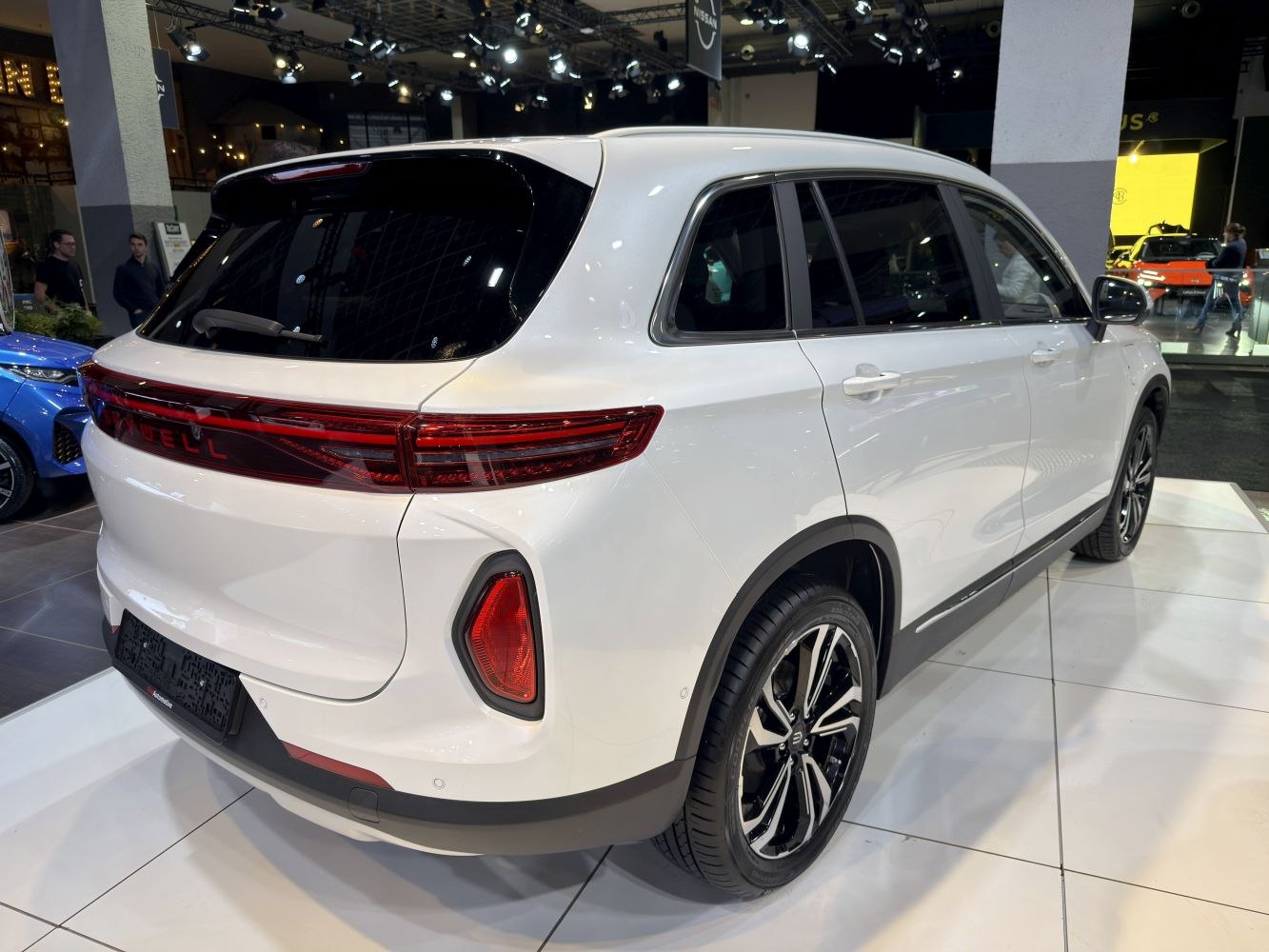 Rear and side exterior of a modern SUV with sleek tail lights and stylish alloy wheels