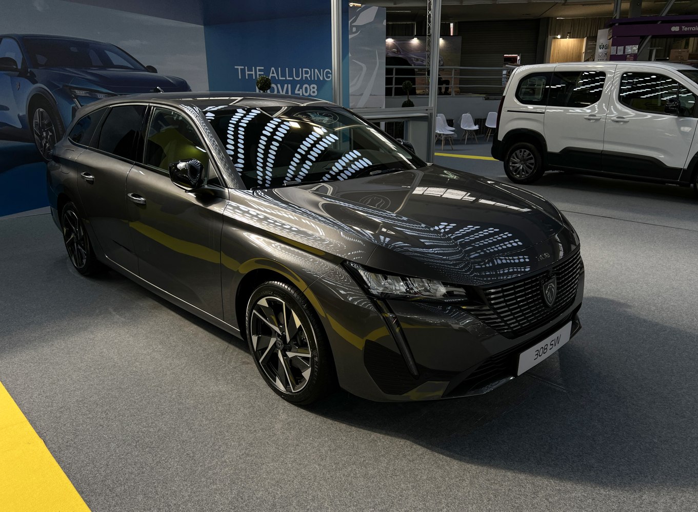 Sleek front and side view with LED headlights and alloy wheels