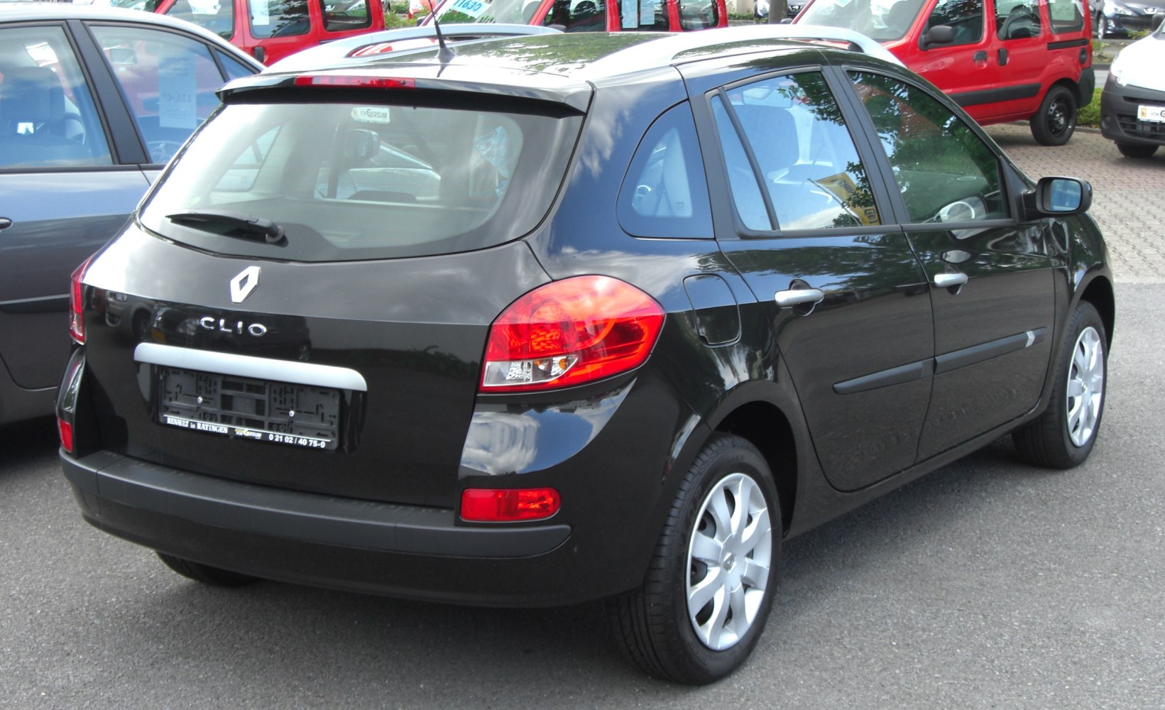 Rear and side view of compact hatchback with distinct tail lights