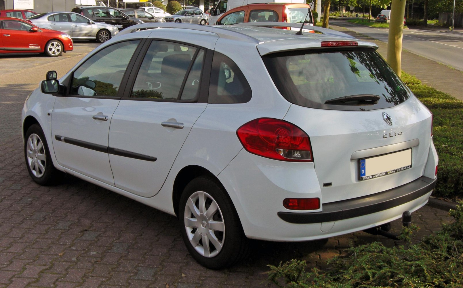 5-door hatchback rear side with roof rails and taillights
