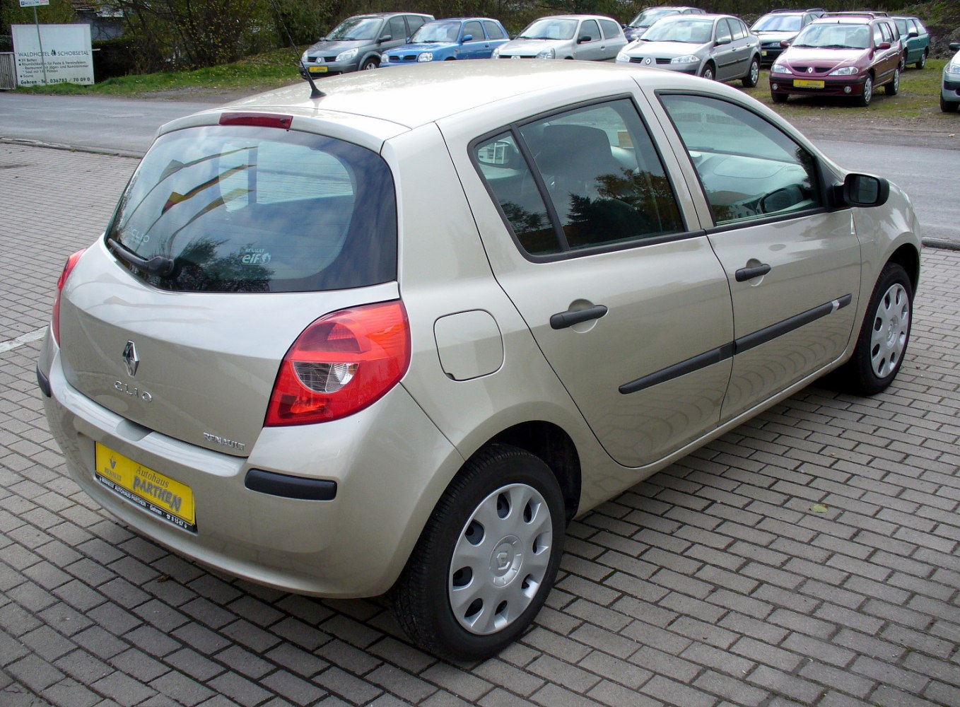 Rear side view of a 5-door hatchback with distinctive taillights.