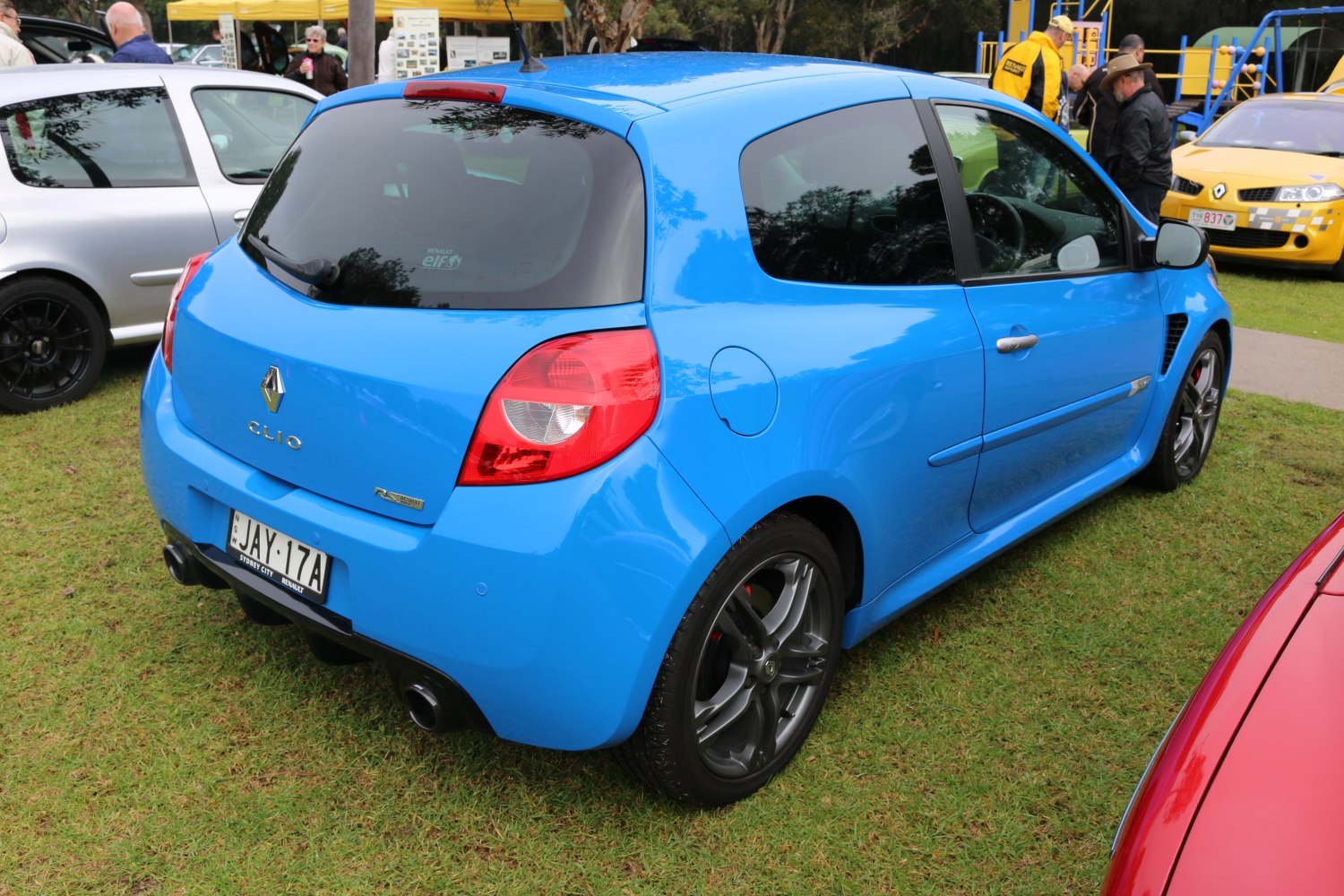 Blue 3-door hatchback rear with dual exhaust and alloy wheels