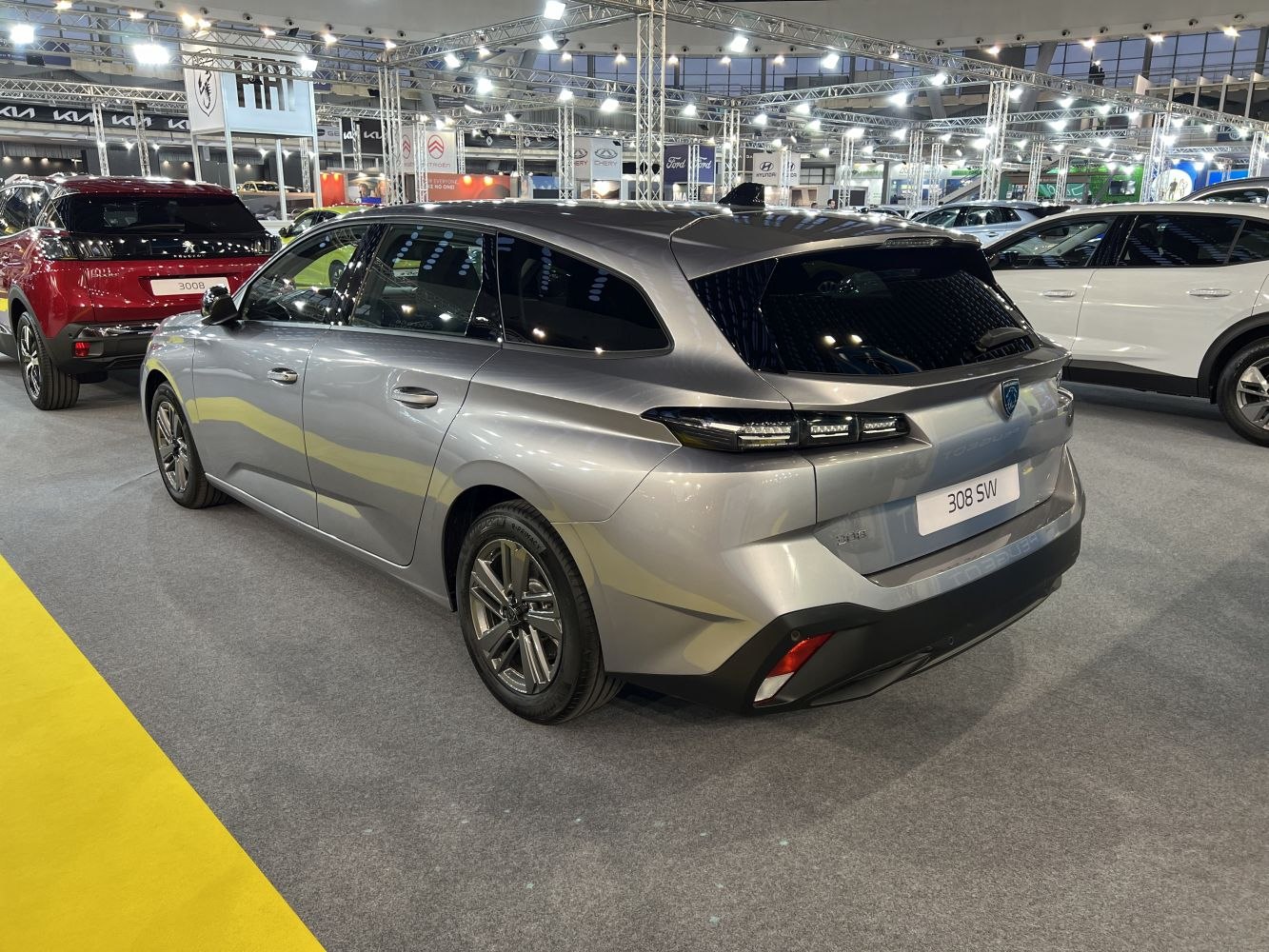 Rear and side view of a station wagon with LED tail lights and tinted windows