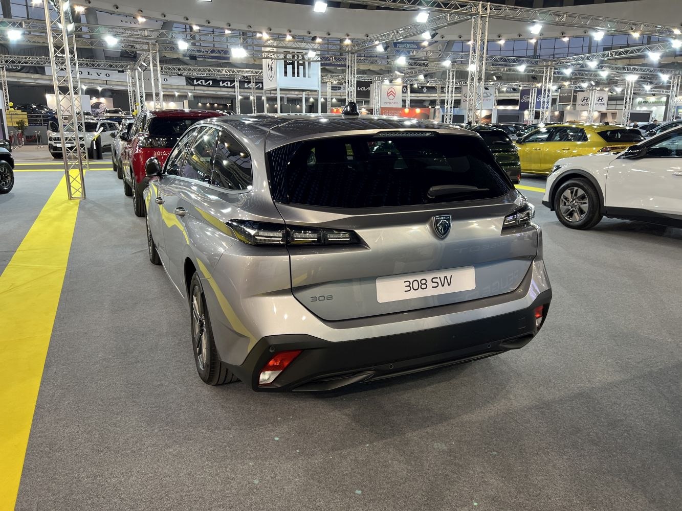 Sleek rear view and modern tail lights of a silver estate car
