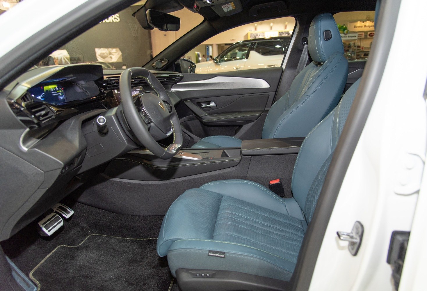 Modern car interior with digital dashboard and ergonomic seats