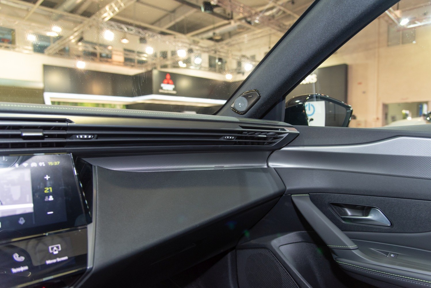 Modern dashboard and door panel with integrated infotainment