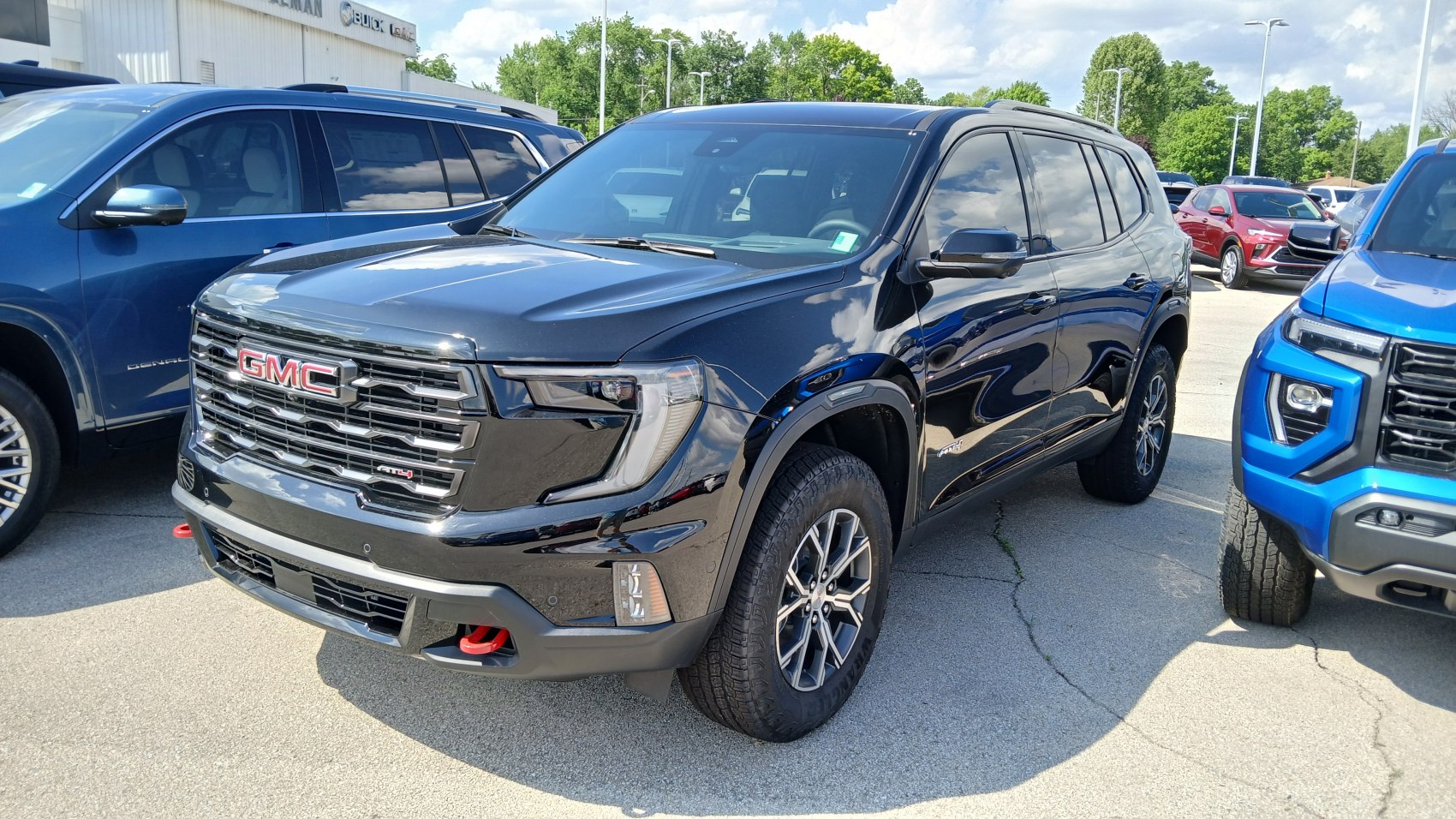Black SUV with prominent grille and sleek modern design