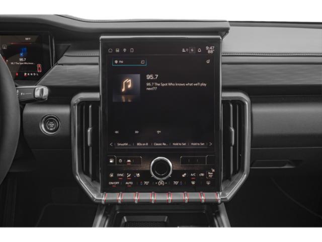 Central infotainment touchscreen with climate and media controls