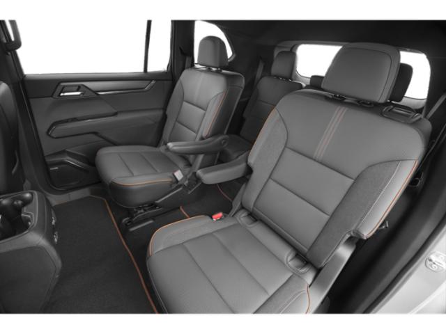 Rear seats with armrest and contrasting stitching in a modern SUV