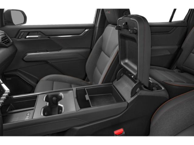 Spacious interior center console and seating with modern design.