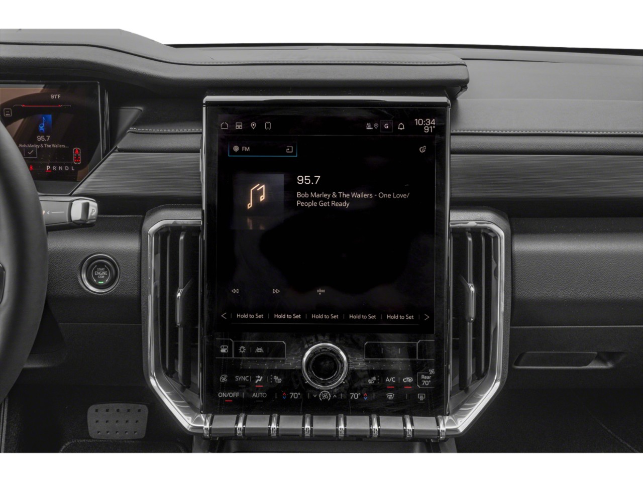 Large vertical touchscreen infotainment with digital climate controls