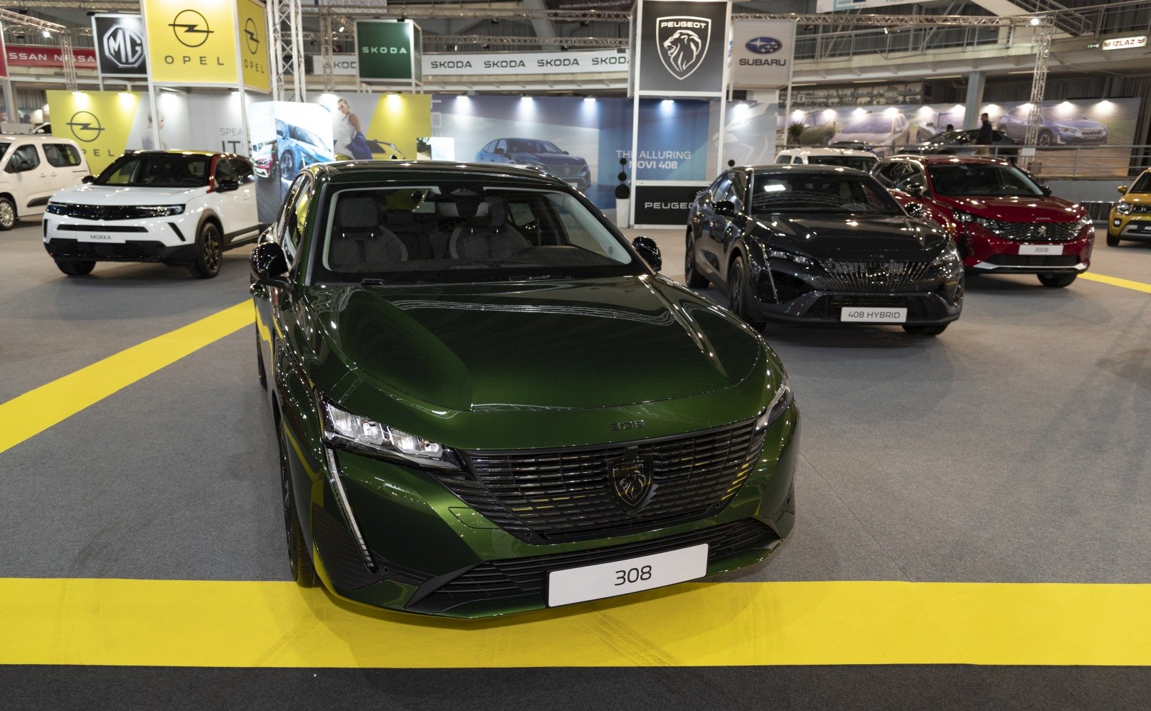 Front view with sleek headlights and distinctive grille