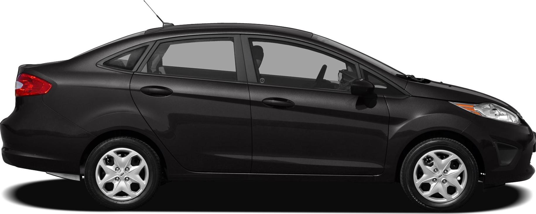 Side profile of a compact four-door sedan with smooth roofline and alloy wheels