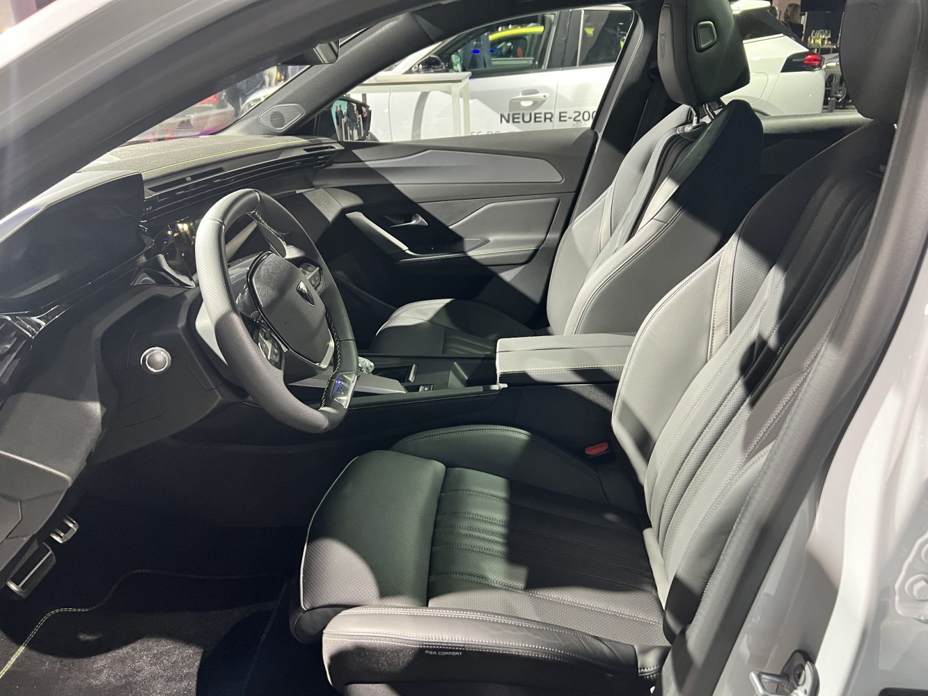 Leather seats and digital dashboard with multifunction steering wheel