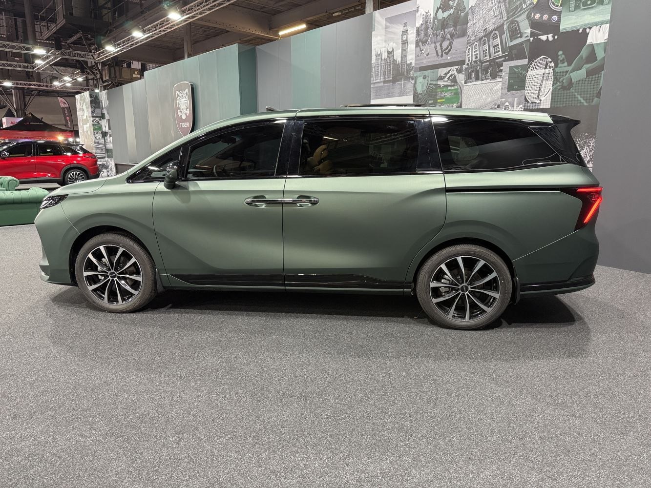Sleek modern minivan side profile with dynamic design