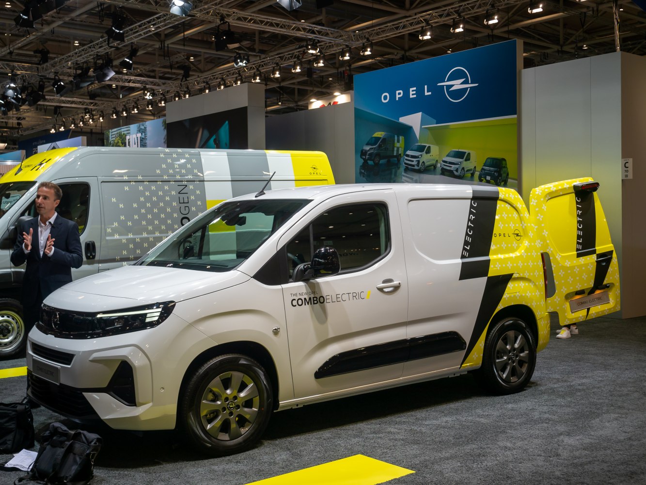 Electric cargo van with open rear cargo door, facelift design