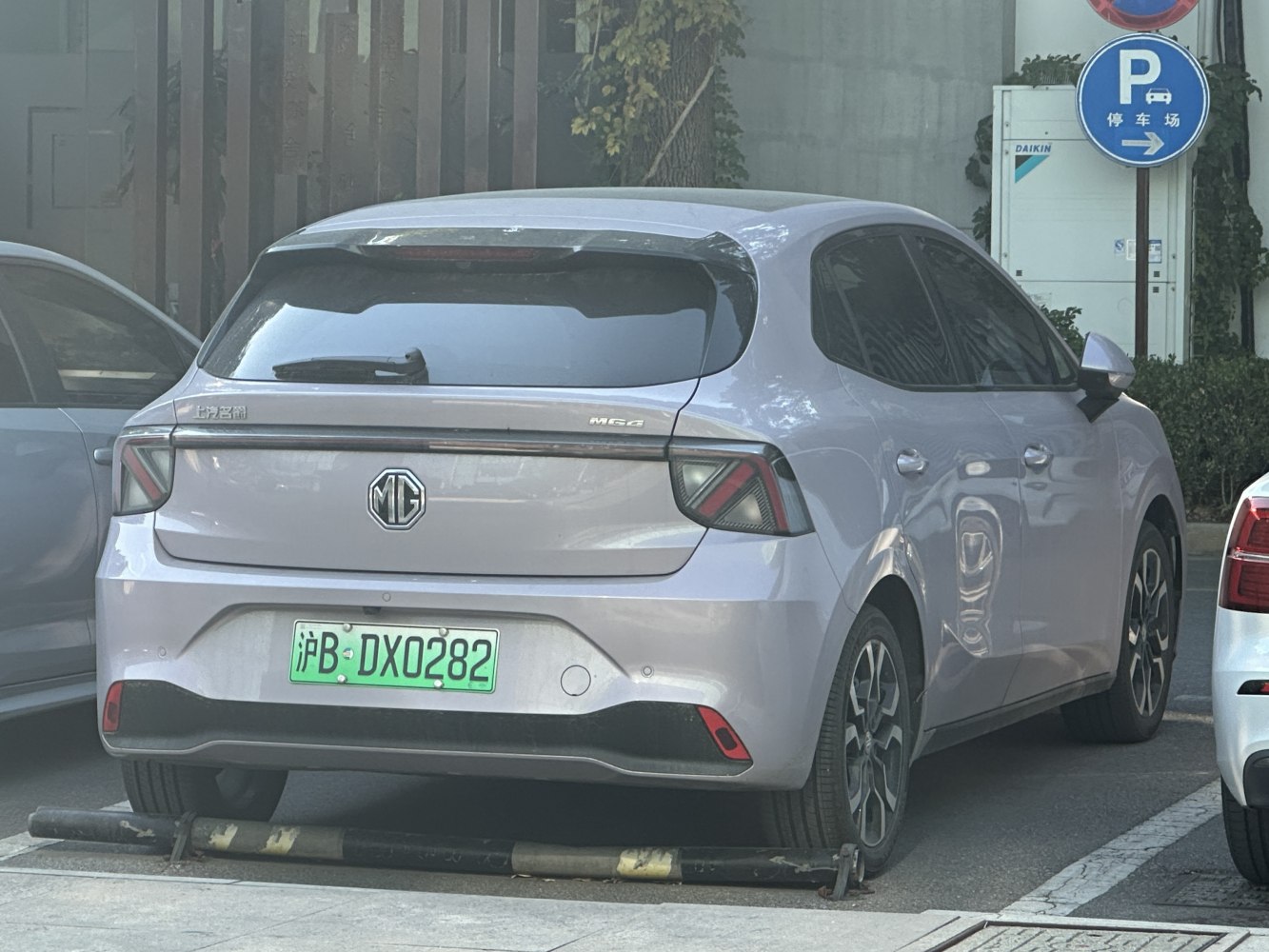 Rear view of hatchback with unique taillight design and sleek body lines