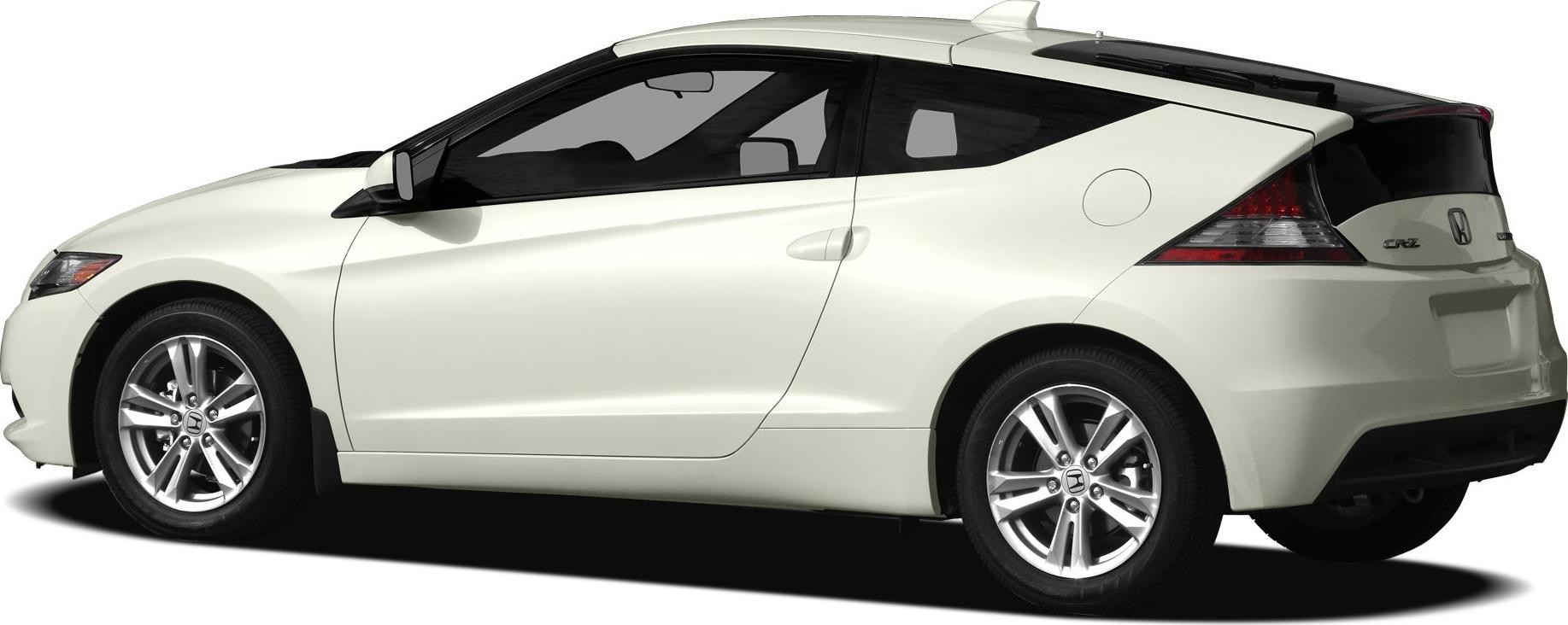 Side profile of compact hybrid coupe with alloy wheels