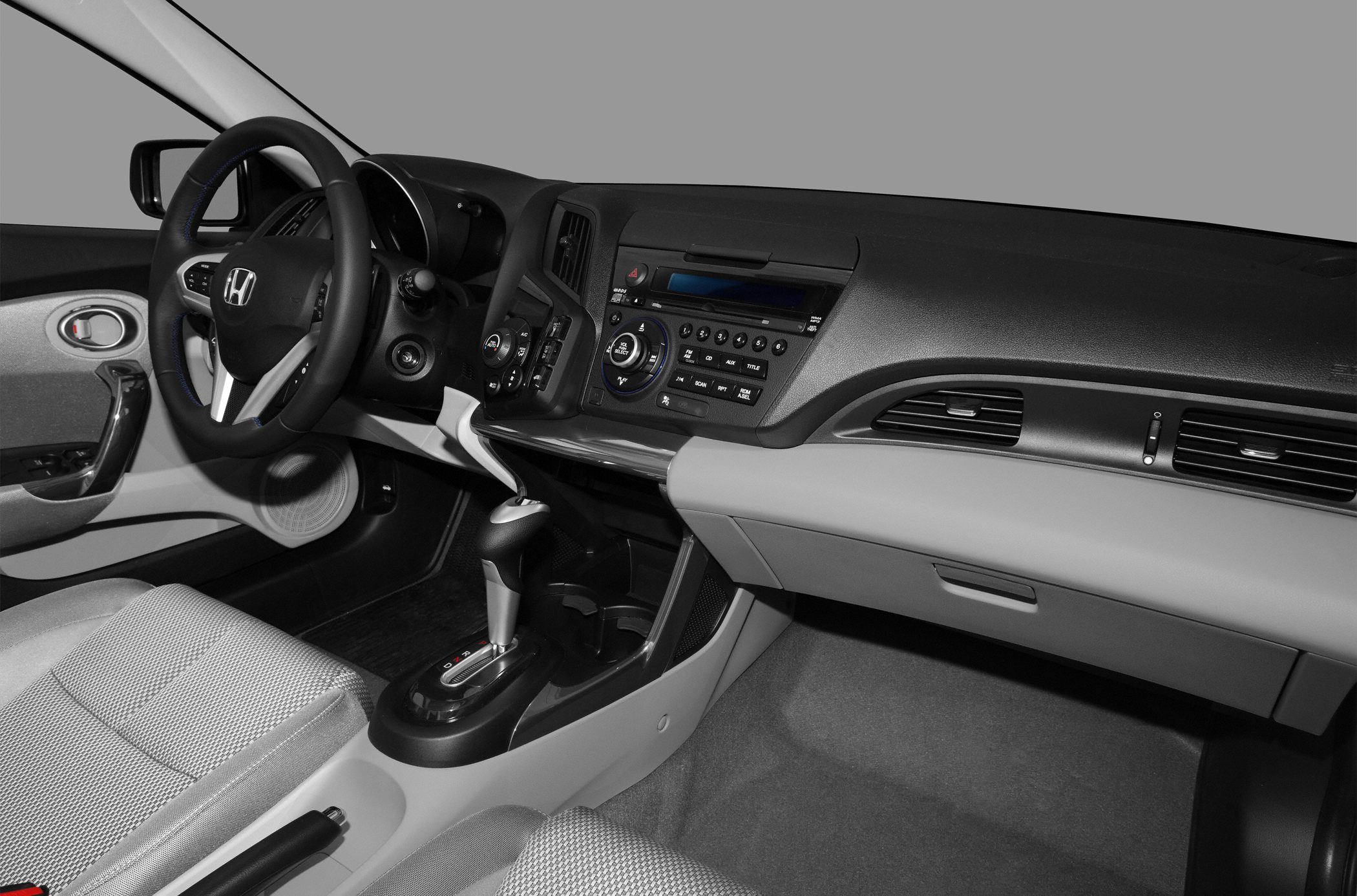 Dashboard, steering wheel, and center console of a car interior