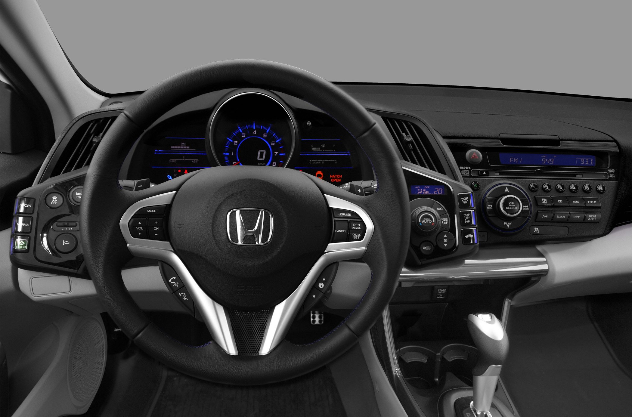 Multifunction steering wheel and digital dashboard of a 2010 car interior