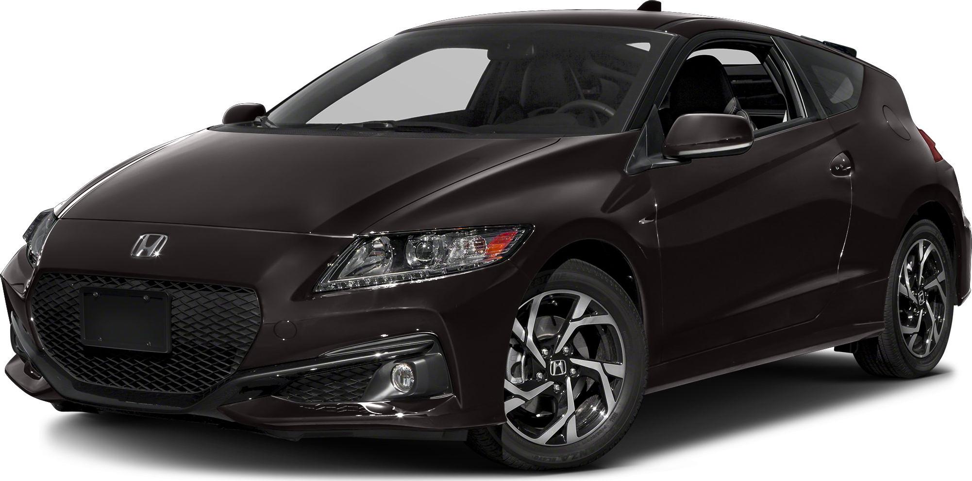 Front angled view showing grille, headlights, and alloy wheels