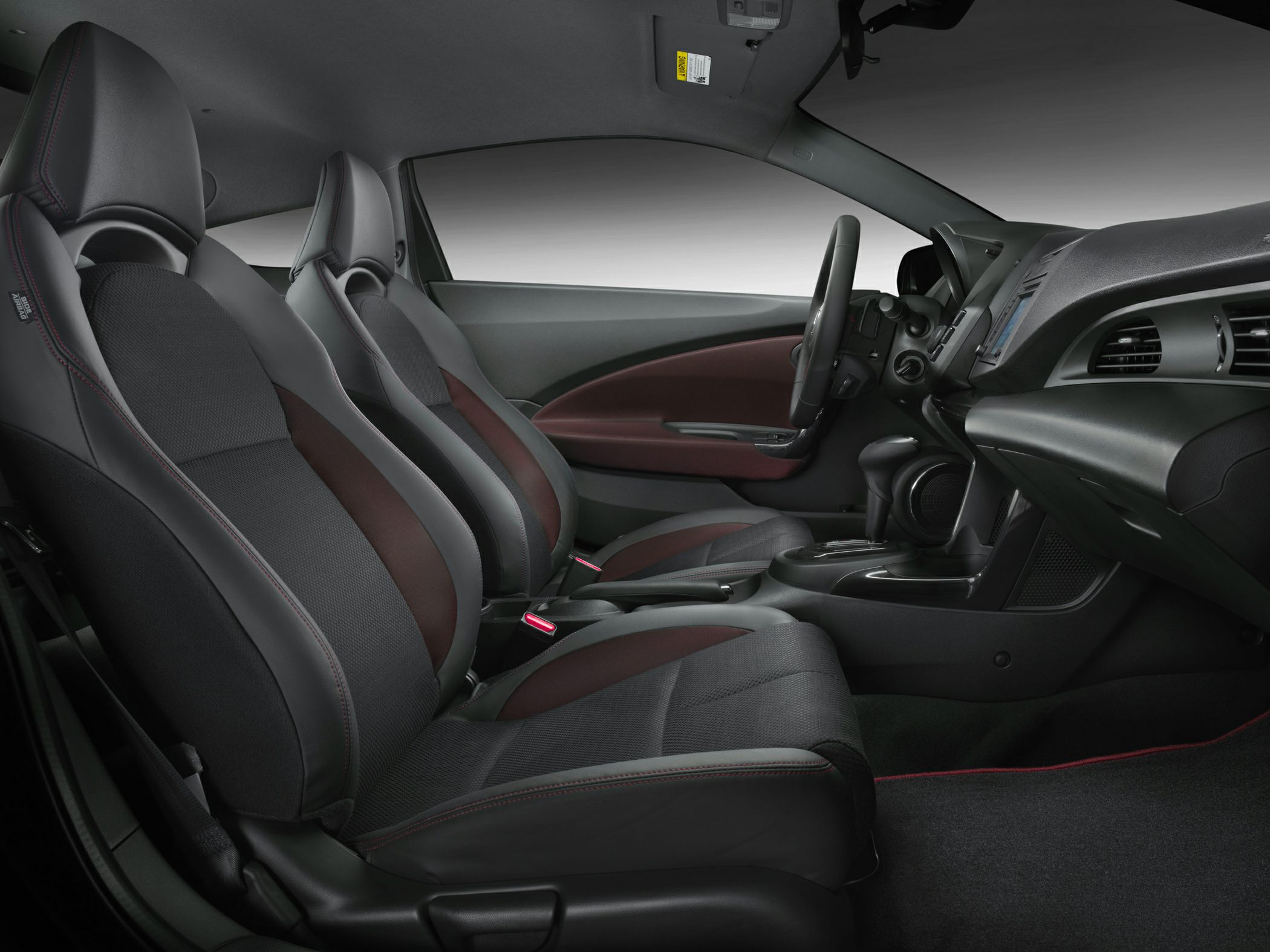 Sporty front seats and modern dashboard interior view