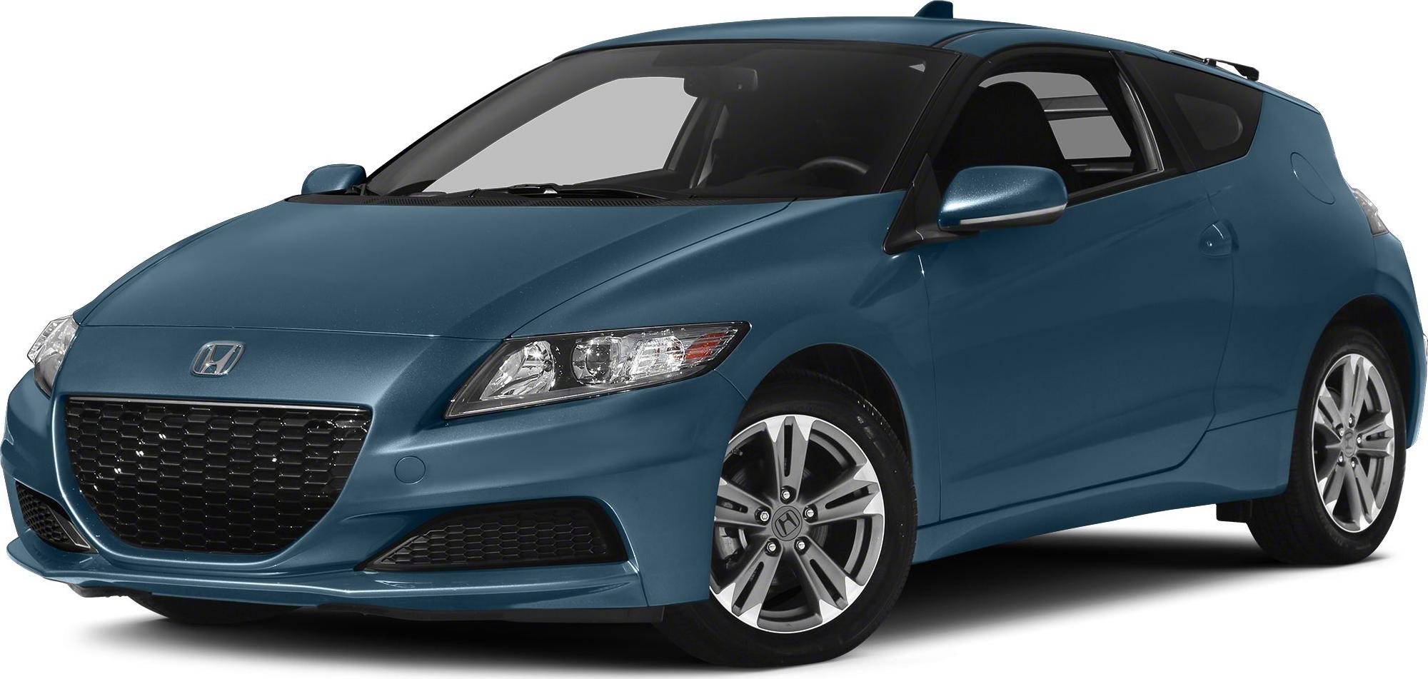 Sporty hatchback front with sleek headlights and large grille