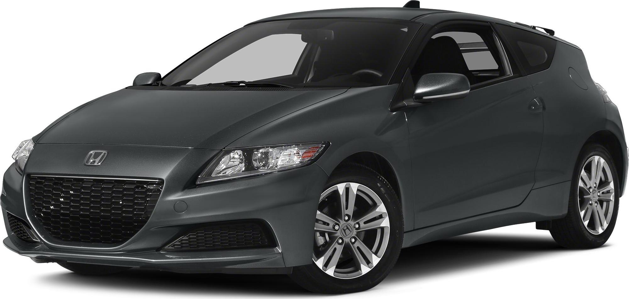 Sporty compact coupe with honeycomb grille and multi-spoke alloy wheels