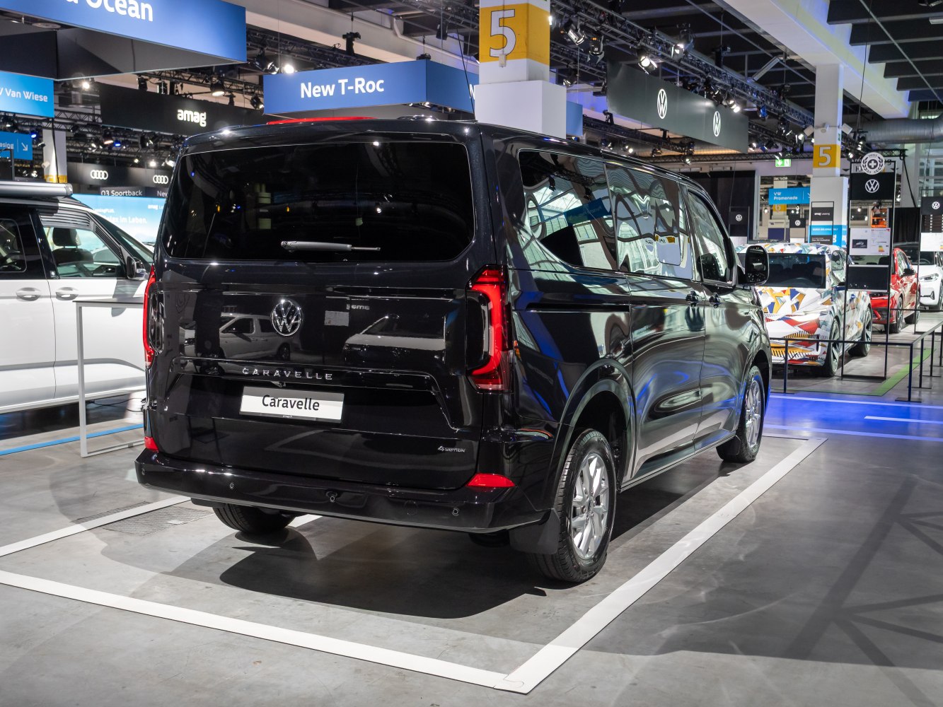 Rear view of black Volkswagen van with modern tail lights