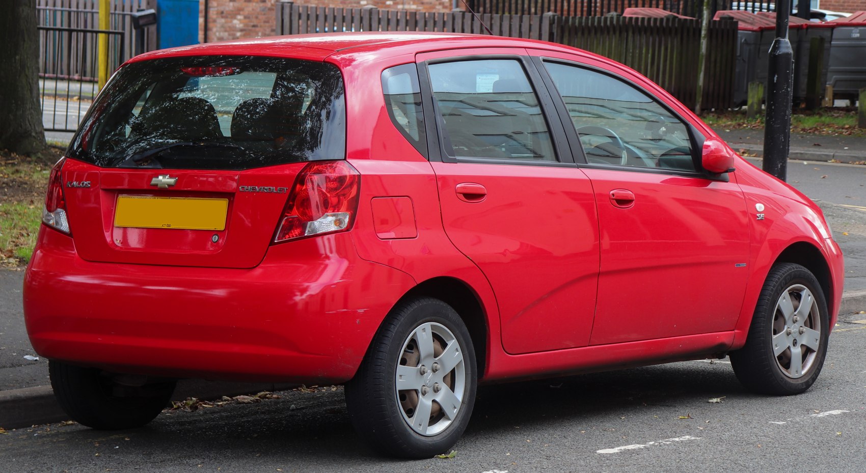 Rear-side view of a compact 5-door hatchback with alloy wheels and prominent taillights