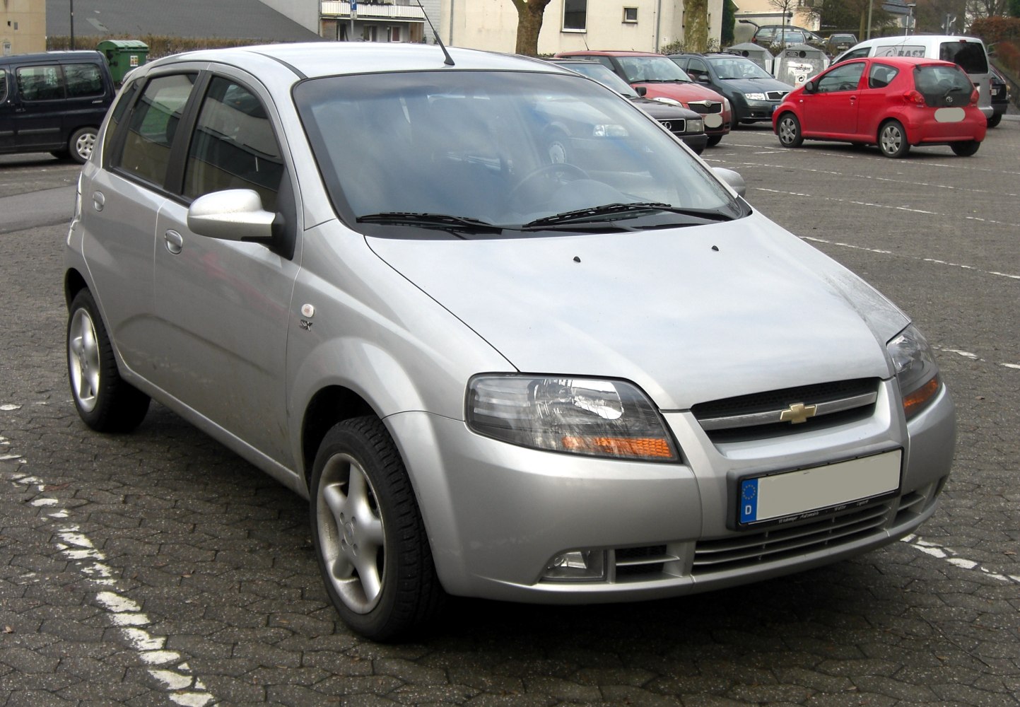 Compact 5-door hatchback with rounded front headlights and simple grille