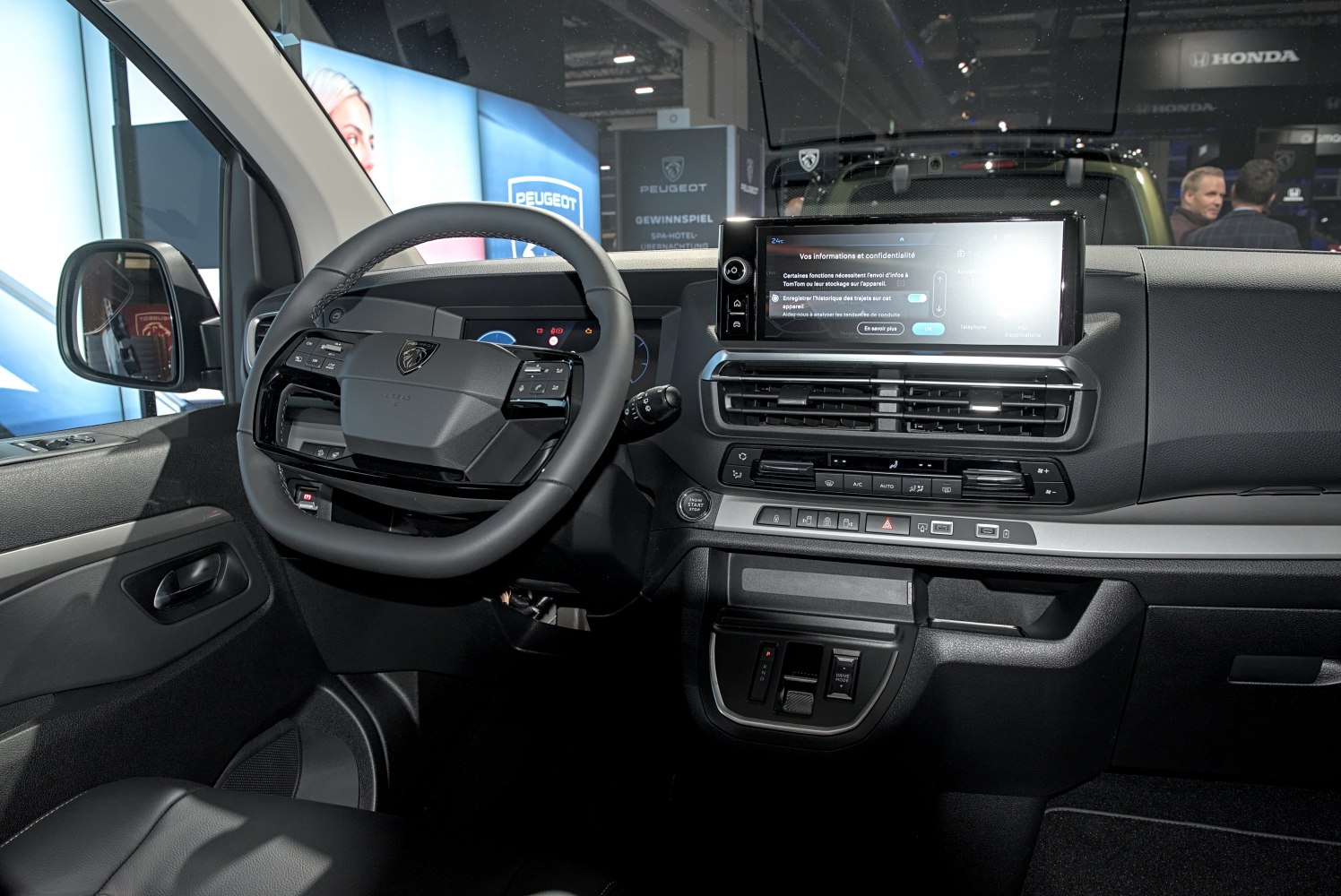 Modern dashboard with touchscreen and steering wheel controls
