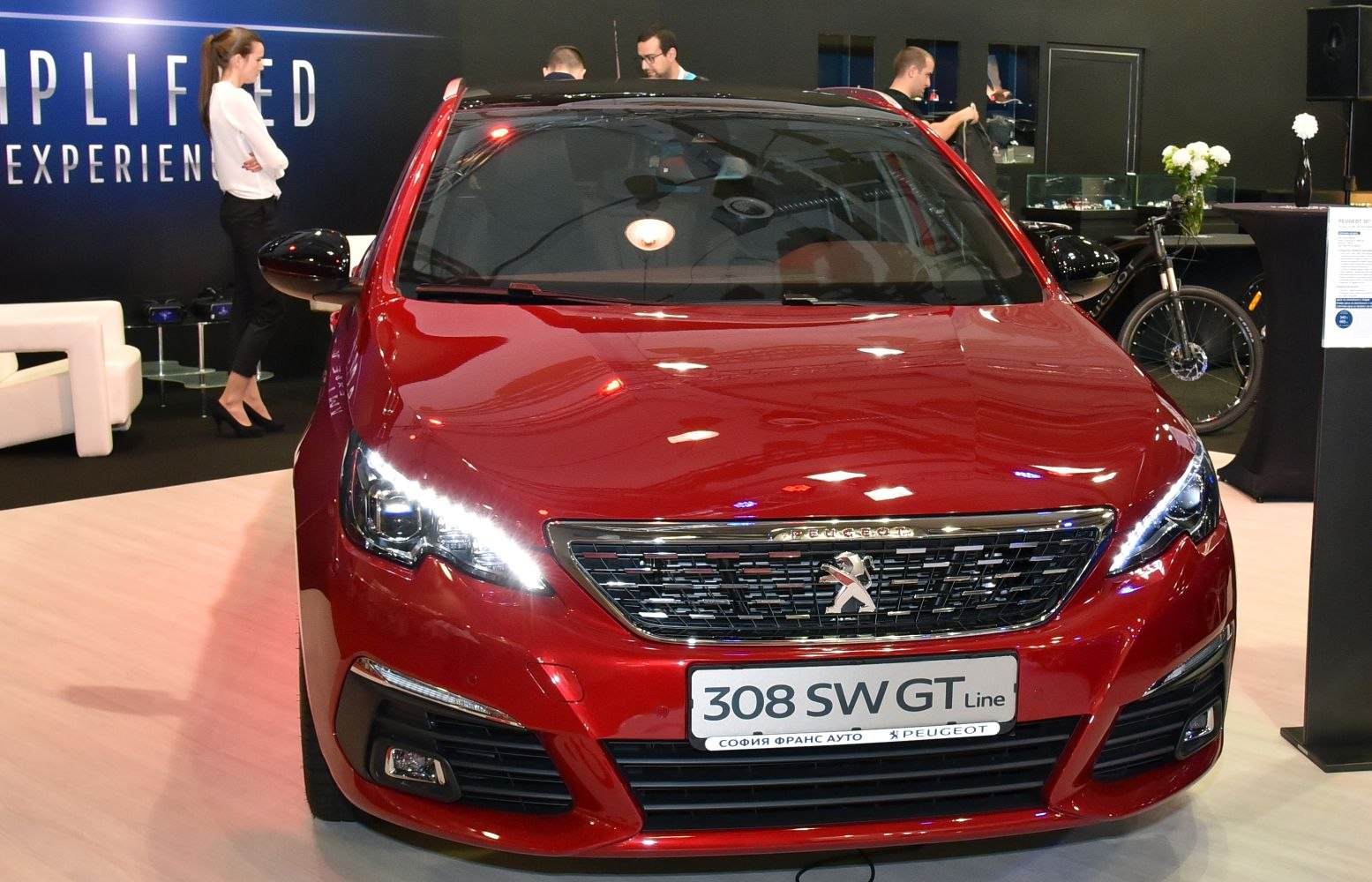 Front view with LED headlights and distinctive grille design