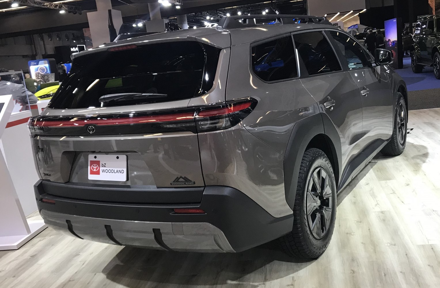 Rear view with continuous LED lightbar and rugged SUV design