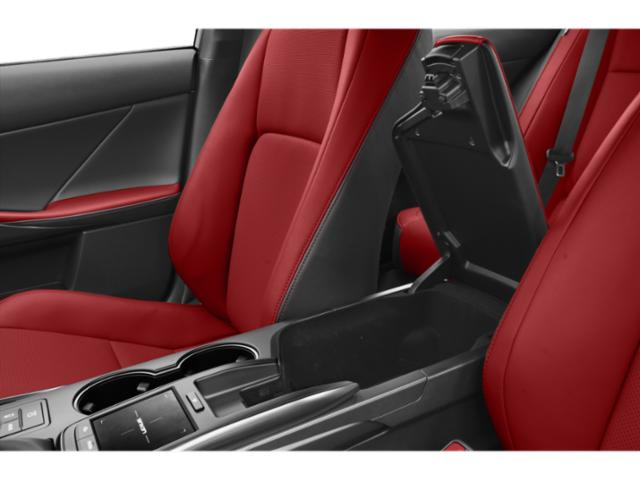 Red leather seats with open center console storage
