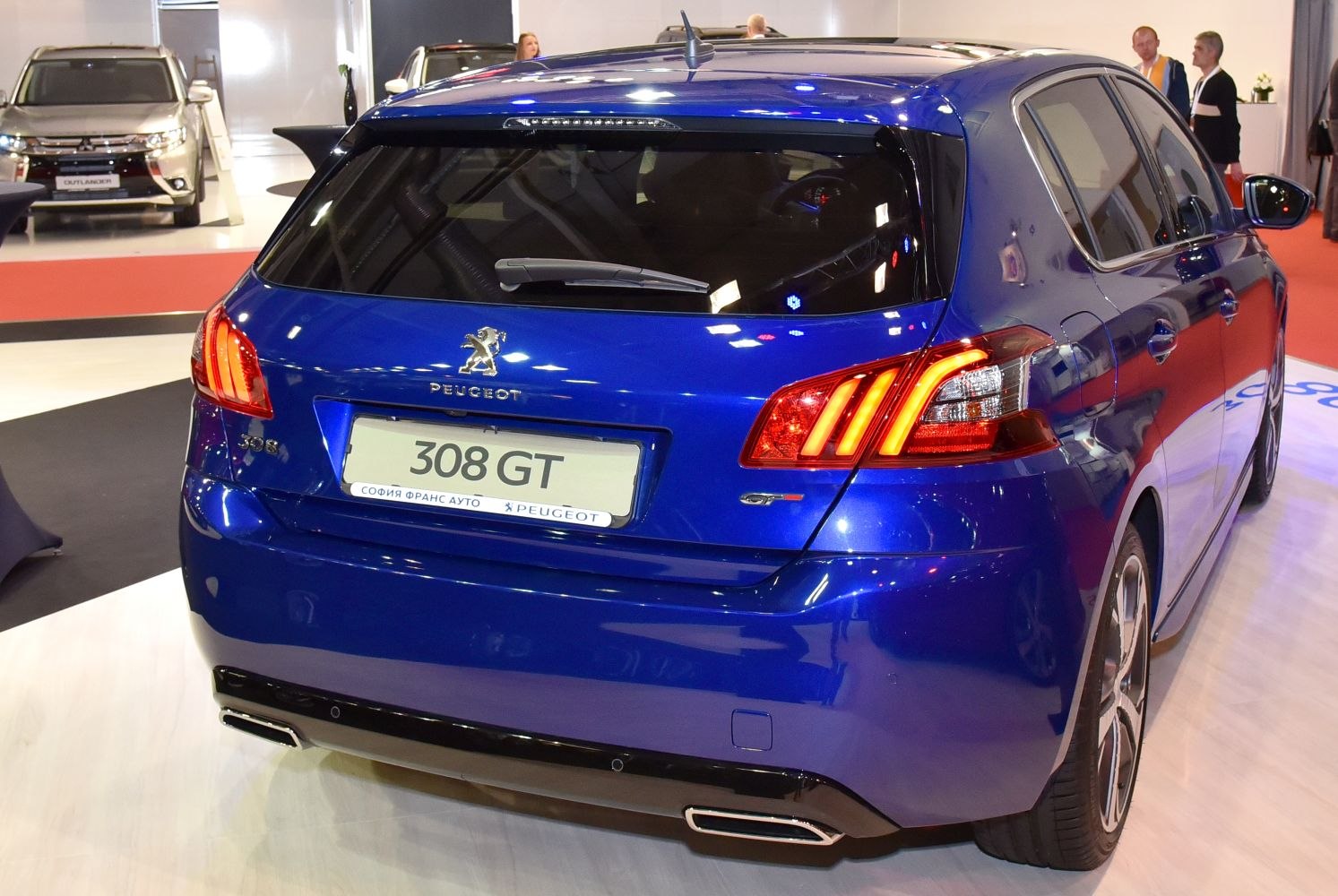 Rear view with distinctive taillights and dual exhaust tips