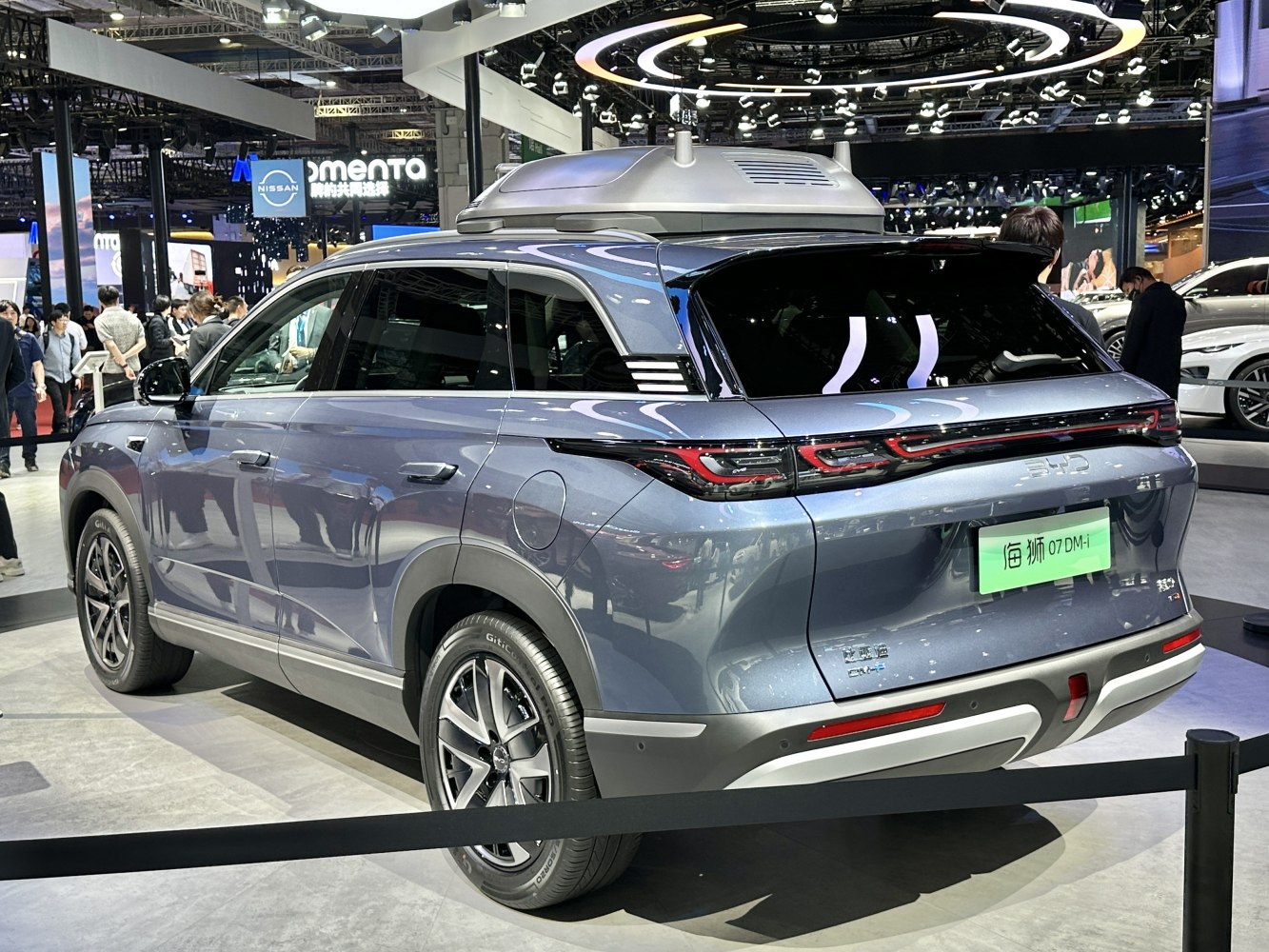 Rear view with sleek LED taillights and rooftop mounted unit