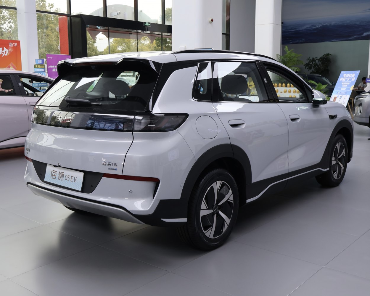 Rear and side view of modern electric SUV with aerodynamic design.