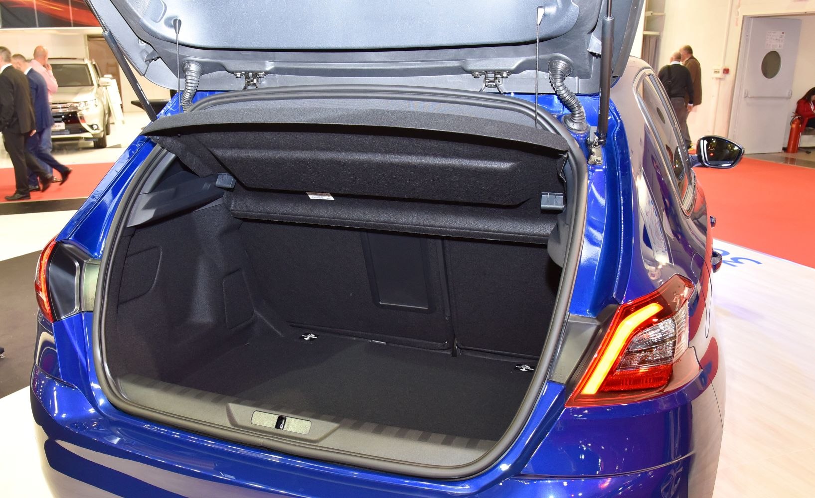 Open rear trunk and spacious cargo area of hatchback