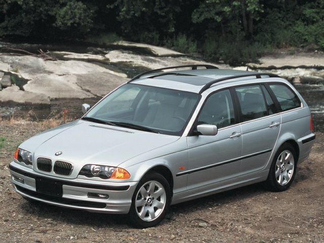Silver estate car with roof rails and alloy wheels