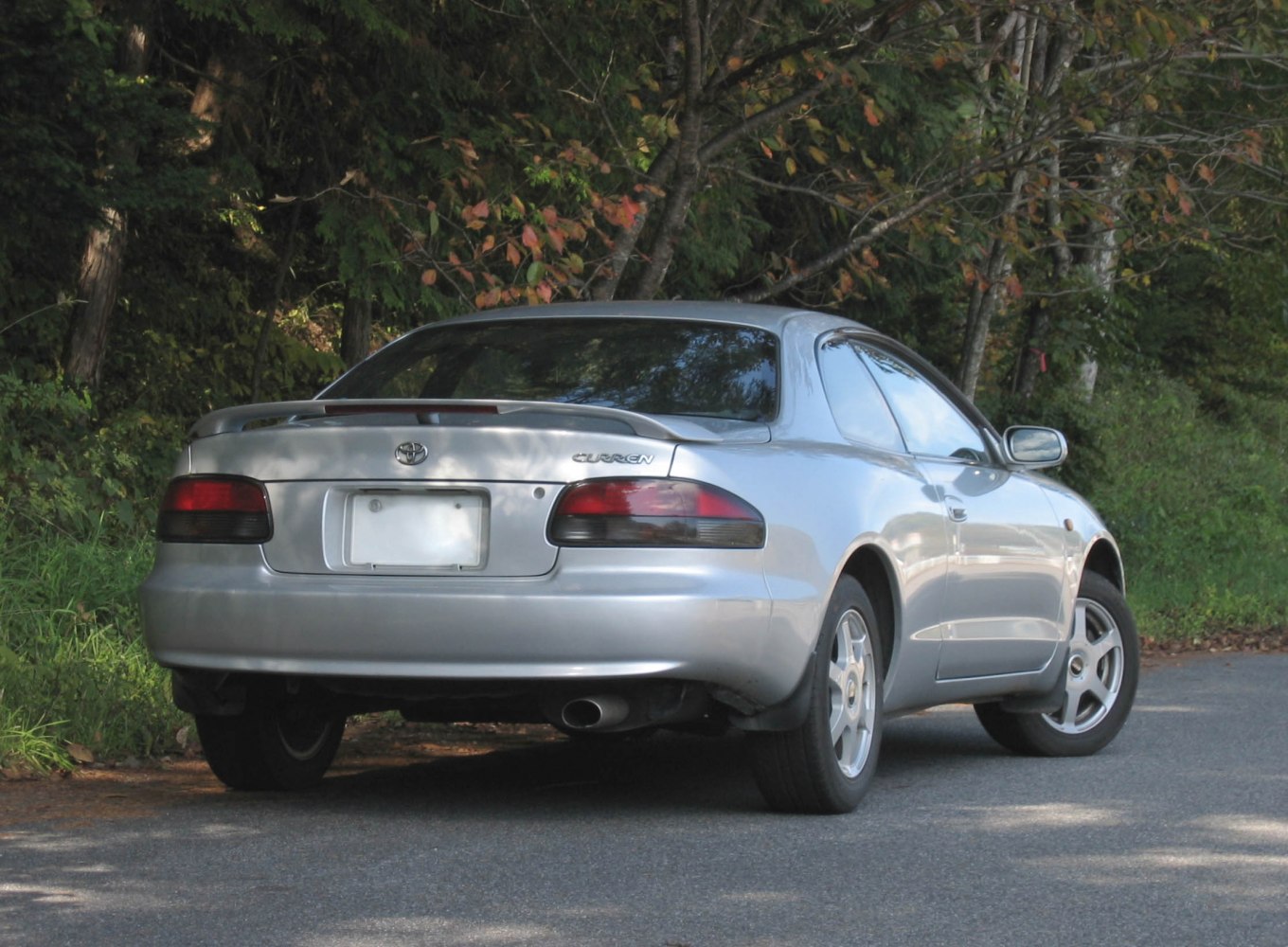 Rear view of 1996 sporty coupe with spoiler and distinctive taillights
