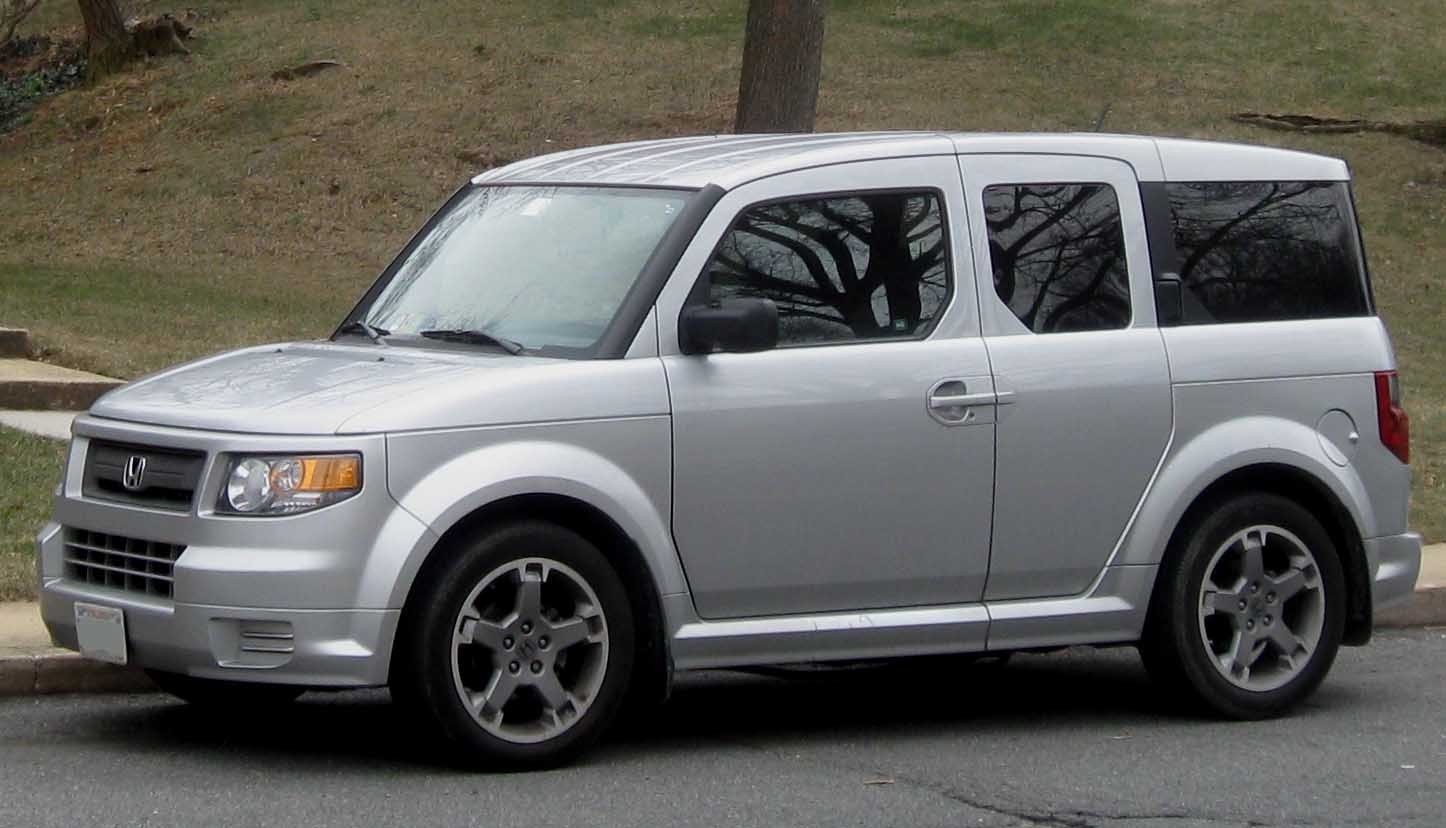 Side profile of boxy silver SUV with five doors and prominent wheel arches