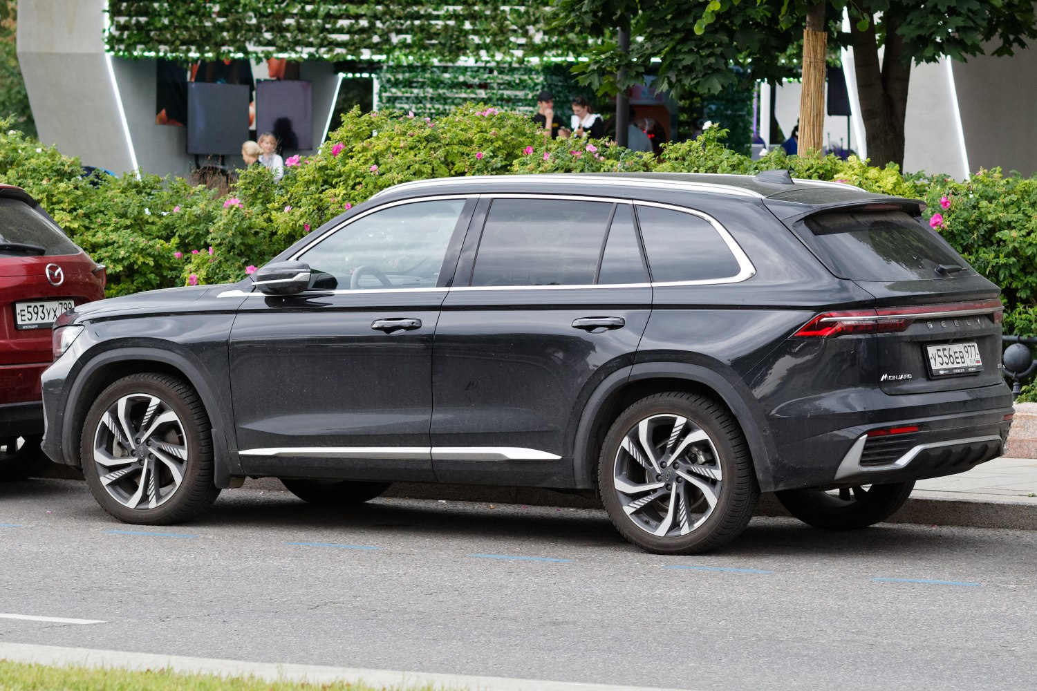 Black SUV with alloy wheels and tinted windows