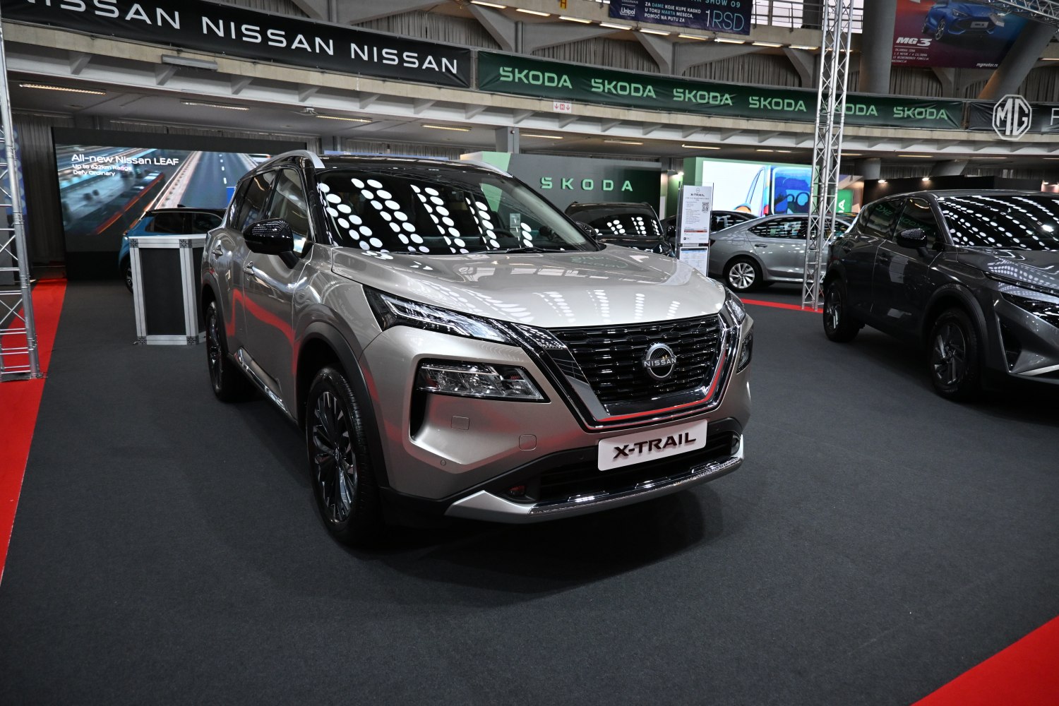 Front view of a modern silver SUV with LED headlights and a distinctive grille