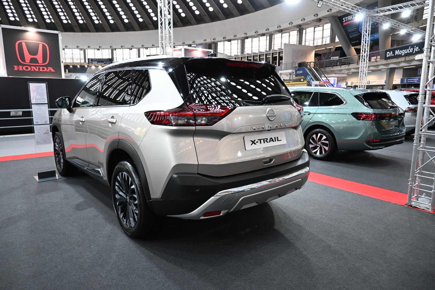 Rear view of a modern SUV with distinctive taillights and alloy wheels