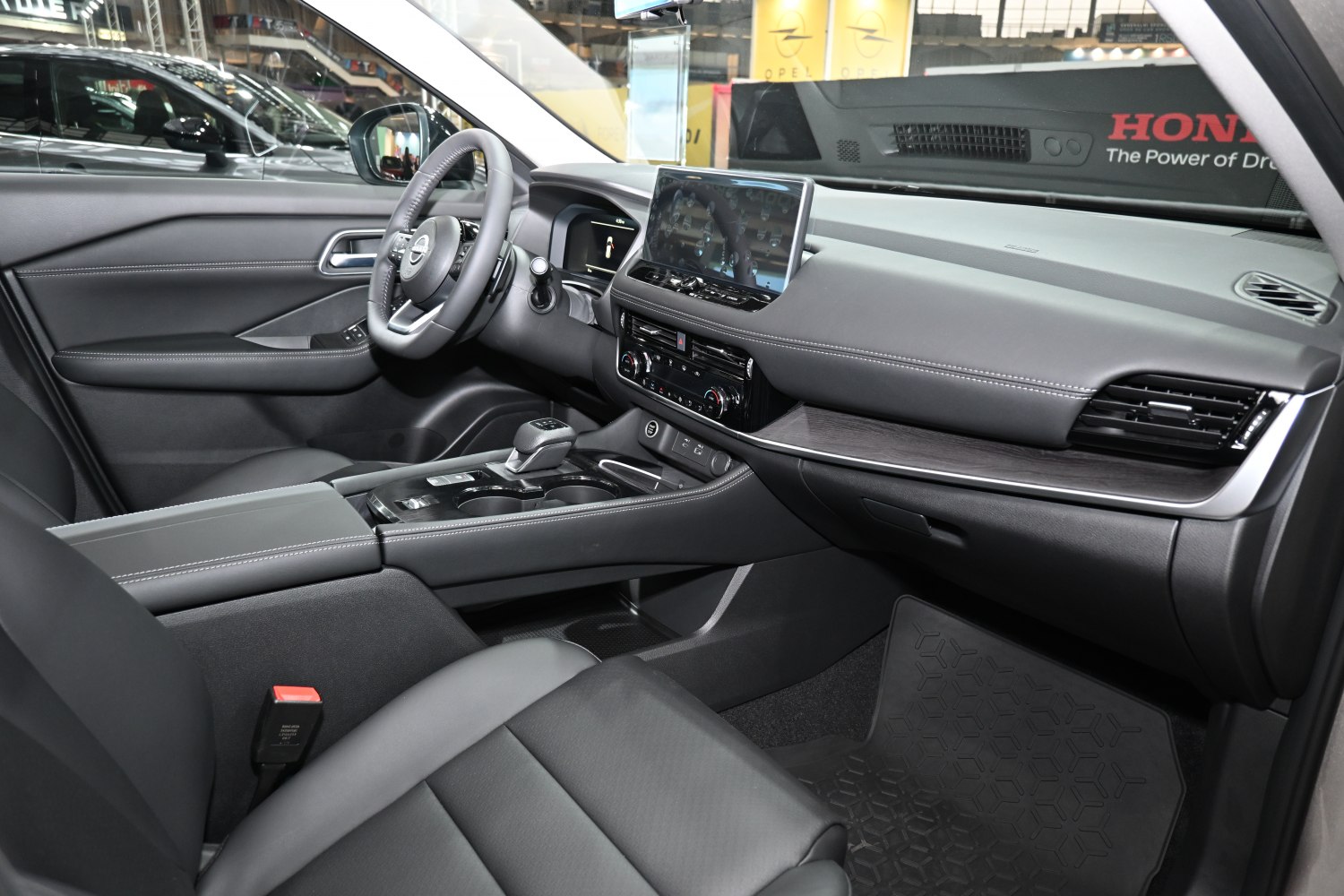 Modern car interior with touchscreen and leather seats